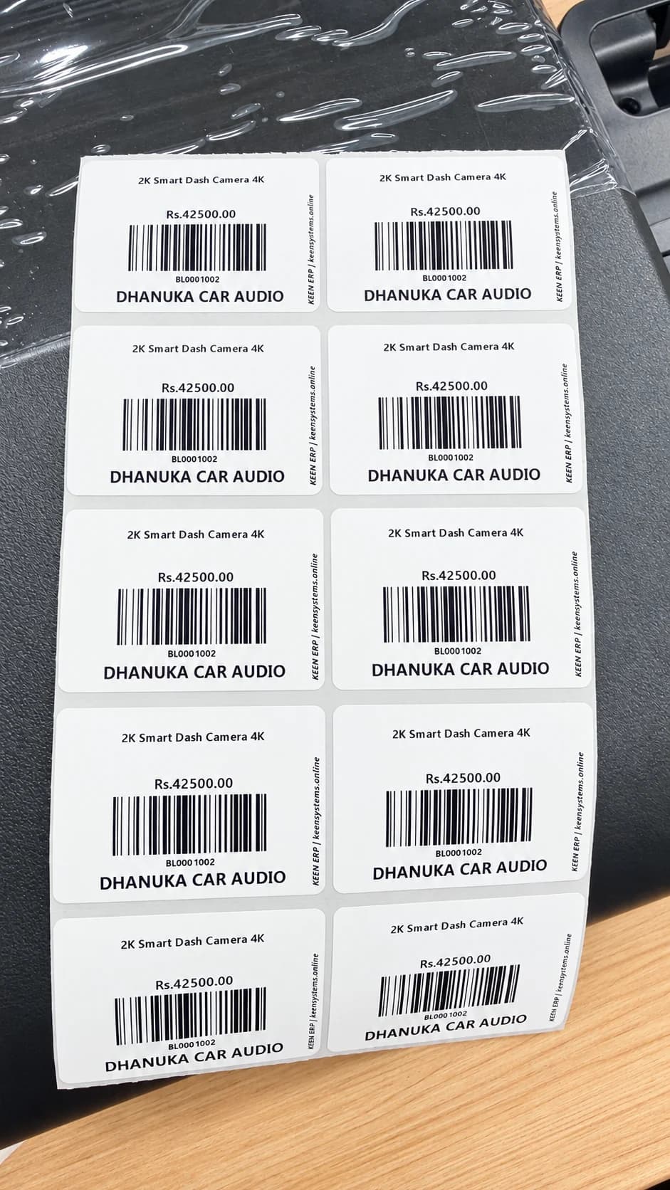 Enhanced close-up of branded car accessory barcode labels