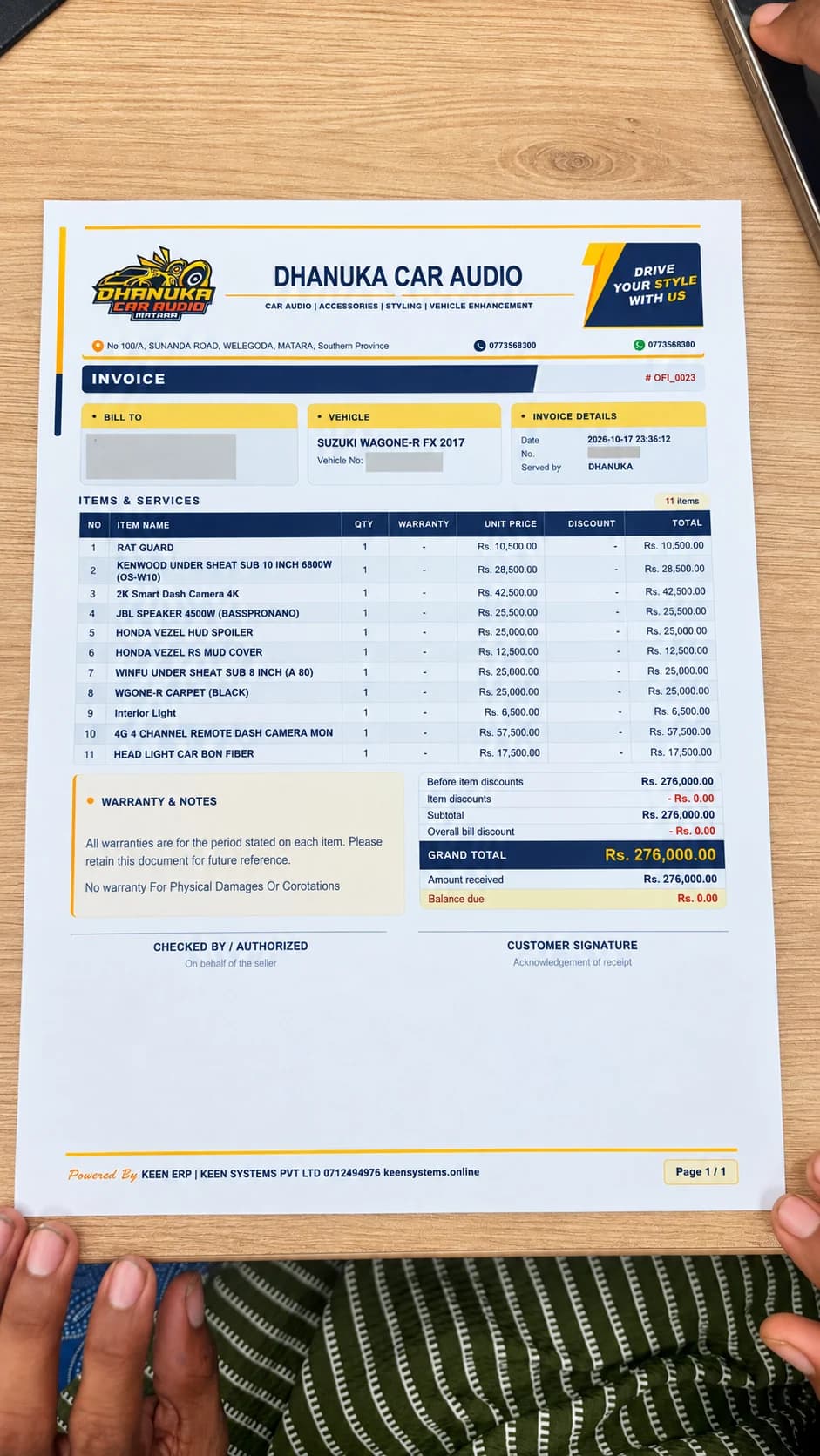 Enhanced Dhanuka Car Audio branded invoice with vehicle and warranty sections