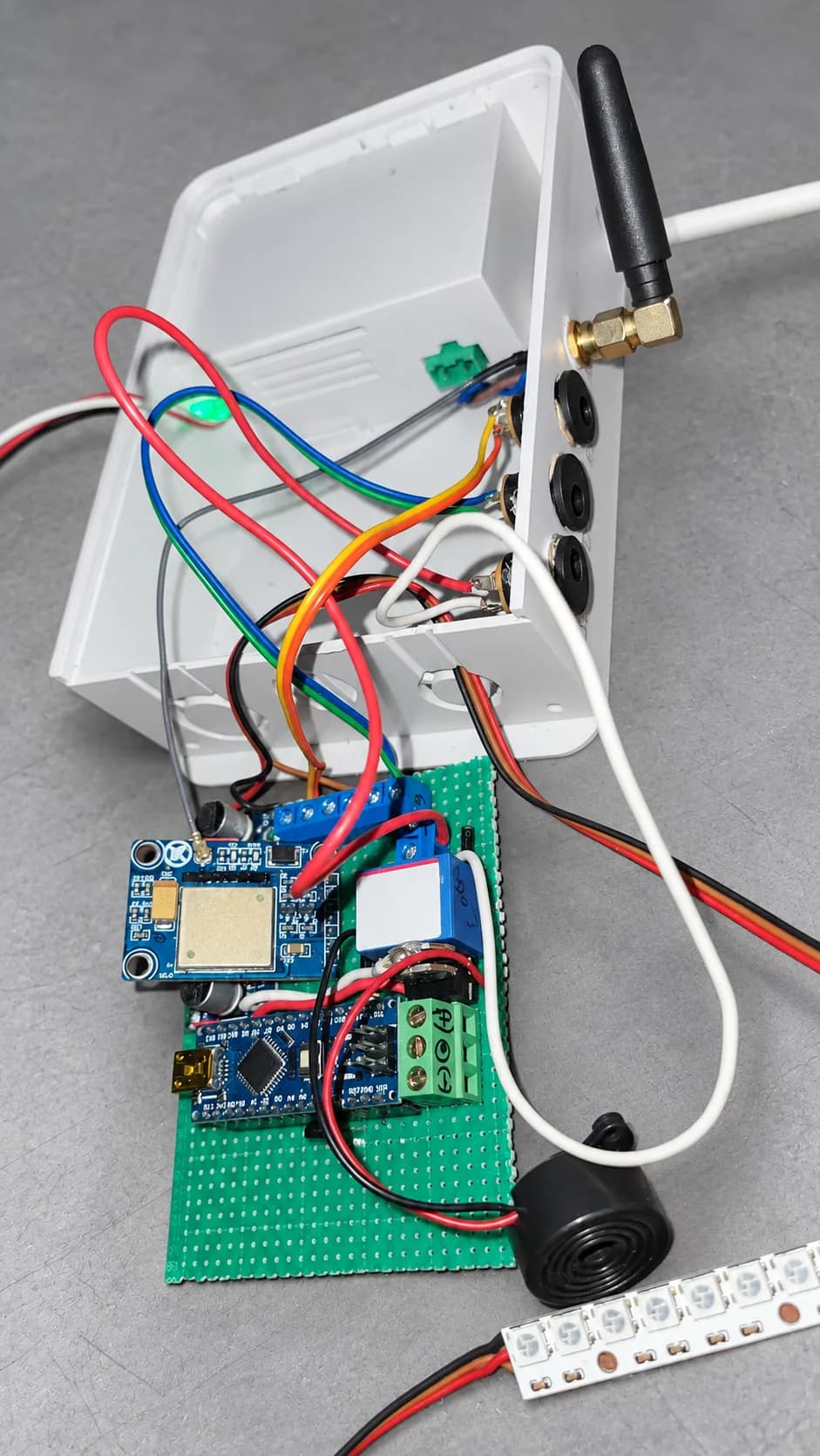 GSM controller, power wiring and audible alert component for the smart locker