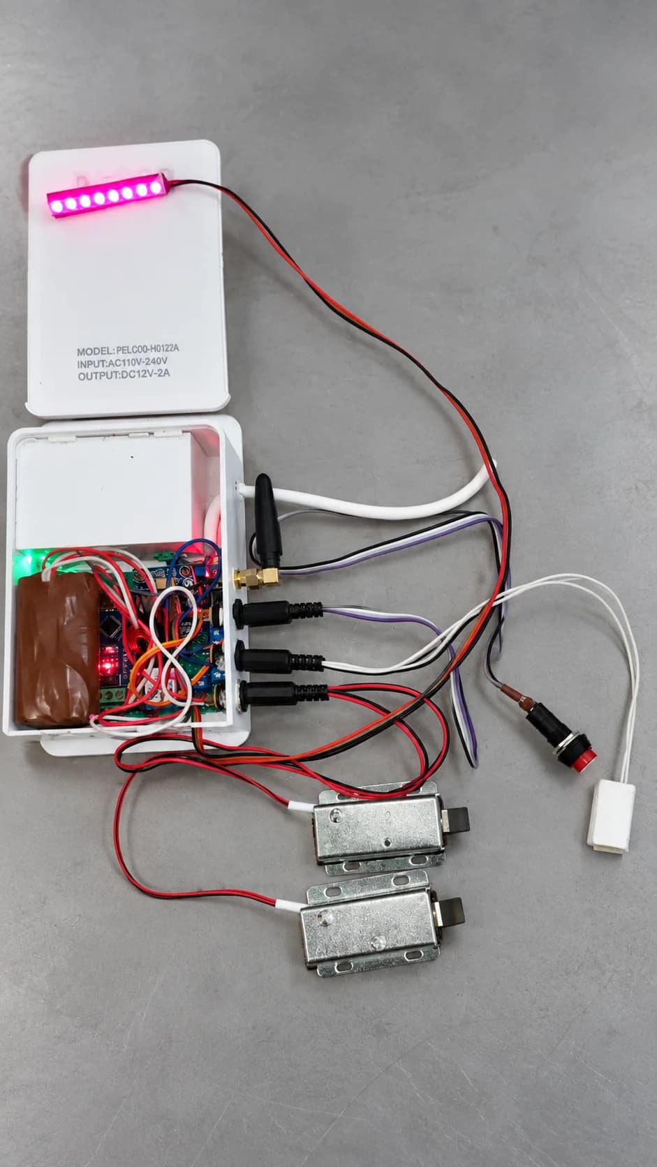 GSM smart key-locker prototype with controller enclosure and electromagnetic locks