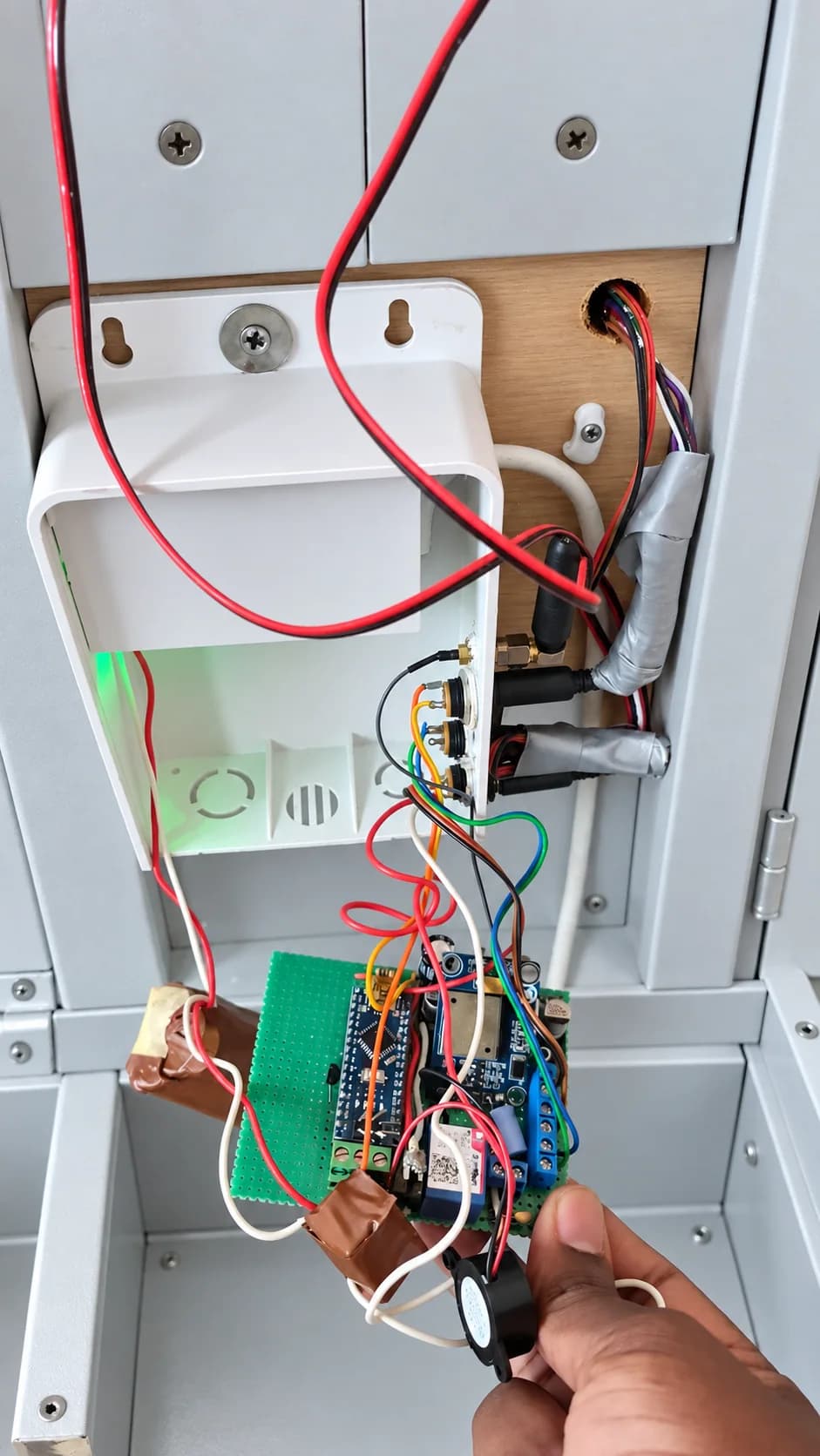 GSM smart-locker controller connected to a key-storage locker at Dilax Chemical