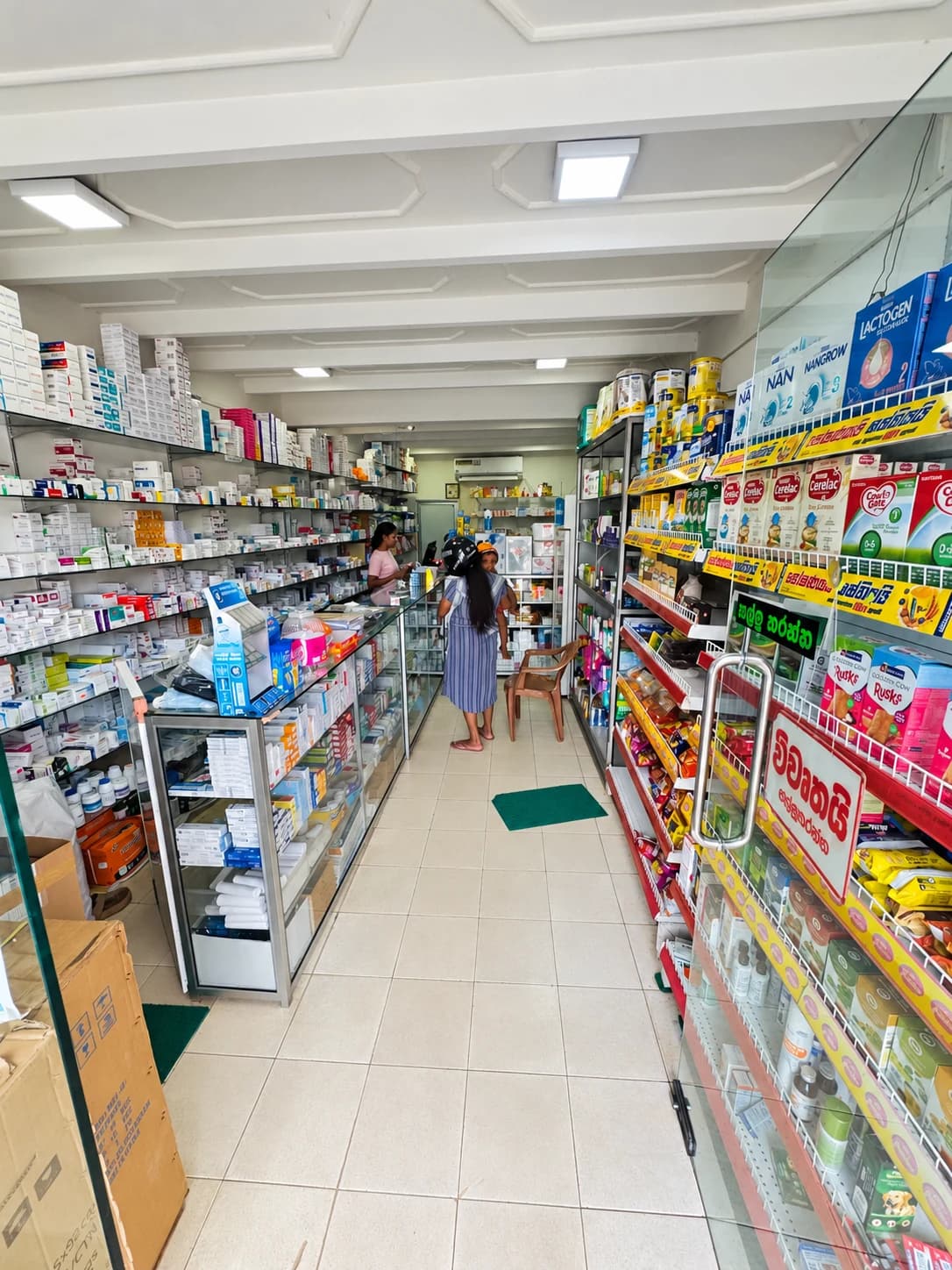 Health Care Pharmacy shelves, service counter and customer area