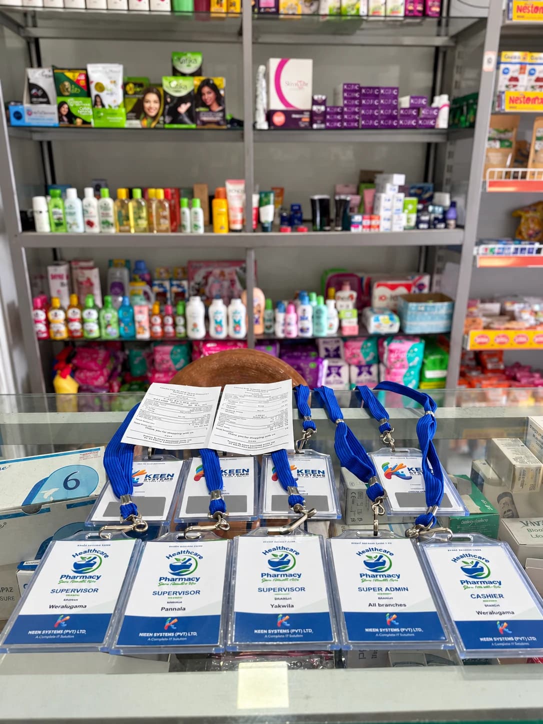 Health Care Pharmacy staff cards and sample receipt output
